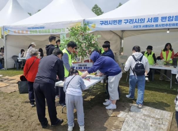 구리가 서울되는 범시민추진위원회, 유채꽃 축제에서 시민 참여 이끌어